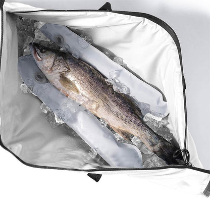 An open Buffalo Gear fish cooler bag containing fish and ice packs, against a white background.